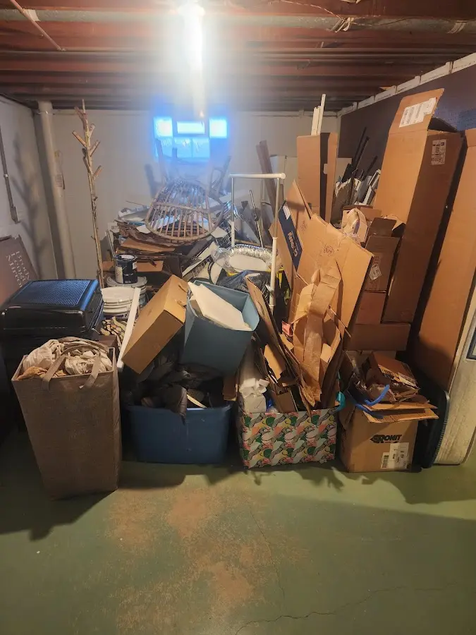 Roll-off dumpster container at job site for 8 Yard Dumpster Rental in DeForest